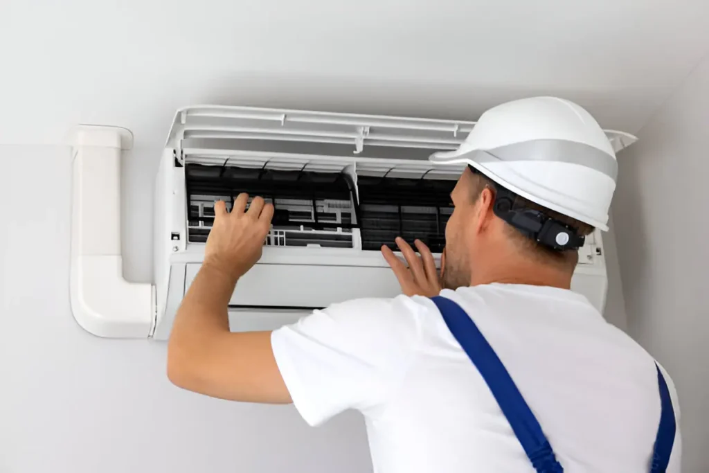 Certified technician performing residential air conditioning services in Clermont